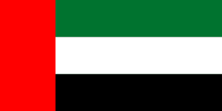 The flag of United Arab Emirates features a red vertical band on its hoist side that takes up about one-fourth the width of the field and three equal horizontal bands of green, white and black adjoining the vertical band.
