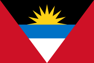 The flag of Antigua and Barbuda has a red field with an inverted isosceles triangle based on the top edge and spanning the height of the field. This triangle has three horizontal bands of black, light blue and white, with the light blue band half the height of the two other bands. The top half of a golden-yellow sun is situated in the lower two-third of the black band to depict a rising sun.