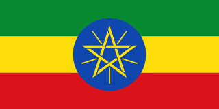 The flag of Ethiopia is composed of three equal horizontal bands of green, yellow and red, with the national emblem superimposed at the center of the field. The national emblem comprises a light blue circle bearing a golden-yellow pentagram with single yellow rays emanating from the angles between the points of the pentagram.