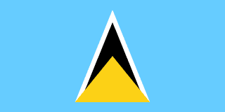 The flag of Saint Lucia has a light blue field, at the center of which are two triangles which share a common base — a small golden-yellow isosceles triangle superimposed on a large white-edged black isosceles triangle.