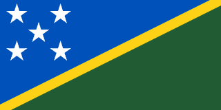 The flag of Solomon Islands features a thin yellow diagonal band that extends from the lower hoist-side corner to the upper fly-side corner of the field. Above and beneath this band are a blue and green triangle respectively. Five white five-pointed stars arranged in an X shape are situated on the hoist side of the upper blue triangle.
