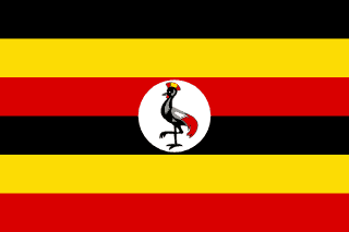The flag of Uganda is composed of six equal horizontal bands of black, yellow, red, black, yellow and red. A white circle bearing a hoist-side facing grey red-crested crane is superimposed in the center of the field.